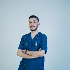Two clinicians reviewing a patient's notes together on a video call